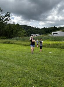 Youth looking at a wetland.