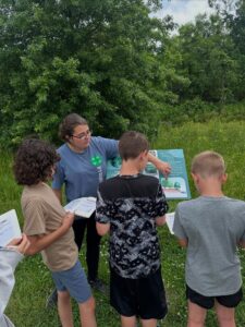 Youth looking at sign